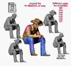 N3 man sitting on the back of pickup truck