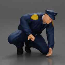 policeman officer sitting and puts handcuffs on a gangster